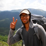 Volunteer with scenic background